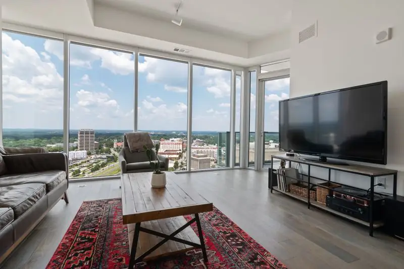 Luxury lounge with panoramic city skyline views